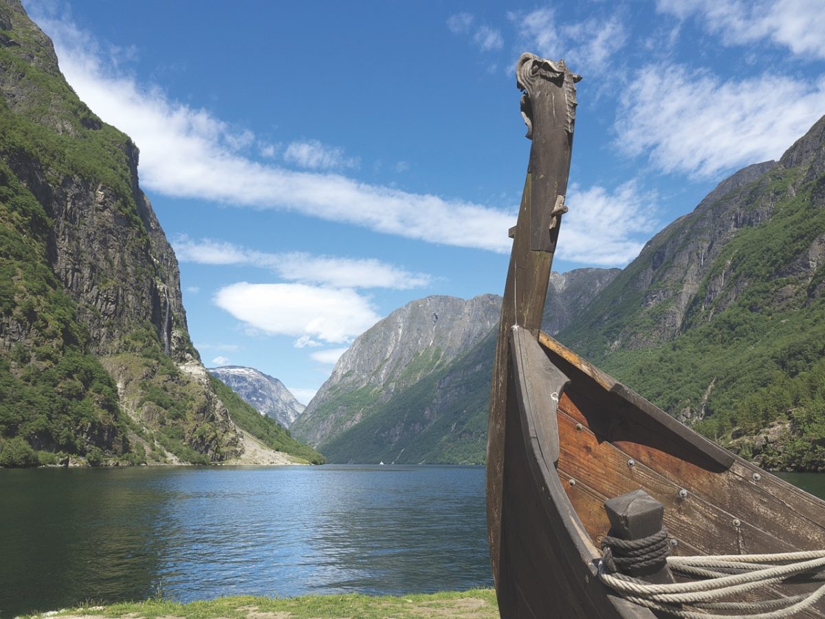 Flåm is a small village set in the spectacular surroundings of Aurlandsfjorden - a branch of Sognefjorden: this is the largest and best known fjord in Norway and the second longest in the world.

Here we see a replica of a small Viking boat displayed in Sognefjord; very appropriate, as 1100 years ago, these would have been launched for terrifying raids (and voyages of exploration) to places as diverse as England, Ireland, France, the Mediterranean, Byzantium, Greenland, Russia and Vinland. A busy bunch, the Vikings!